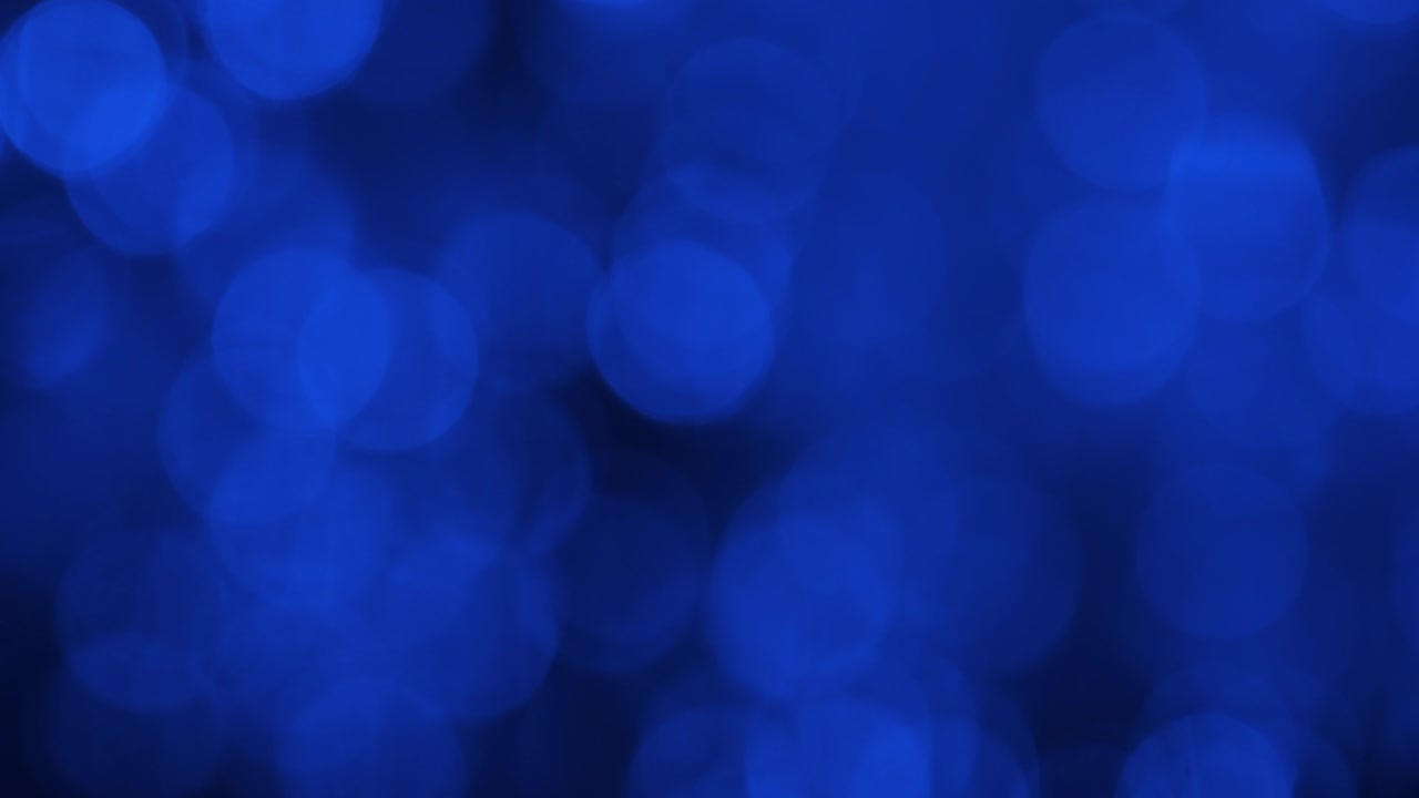 borrón abstracto bokeh. aproximación luces azules brillantes. fondo abstracto luces desfocalizadas luces bokeh desfocalizadas y destello de la lente.