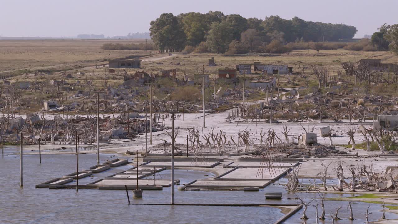 Upward drone fly at the part of ruined Villa Epecuén historical and abandoned village, Province of Buenos Aires, Argentina