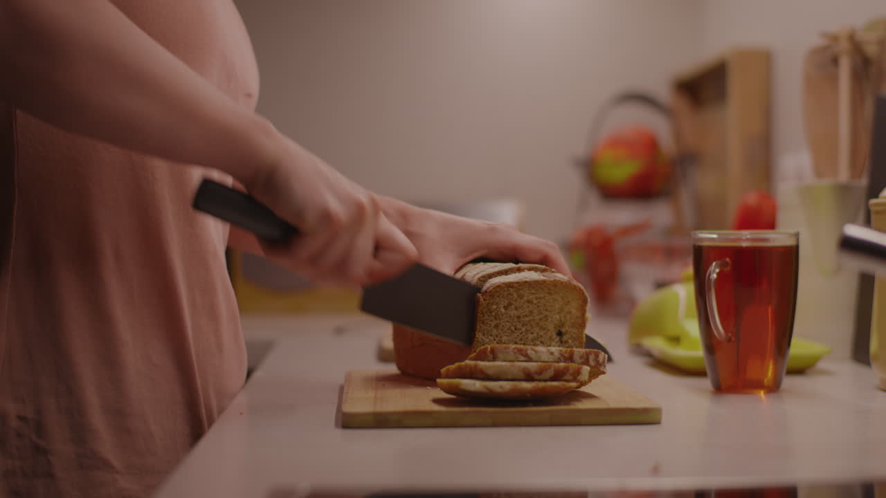 Slicing Bread in the Kitchen