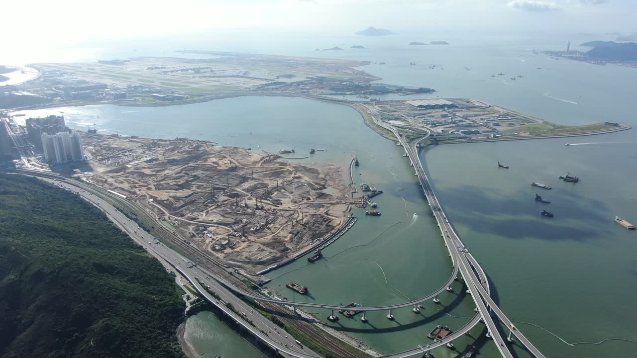 instalaciones de cruce fronterizo de hong kong y puente principal y sistema de carreteras en construcción, vista aérea
