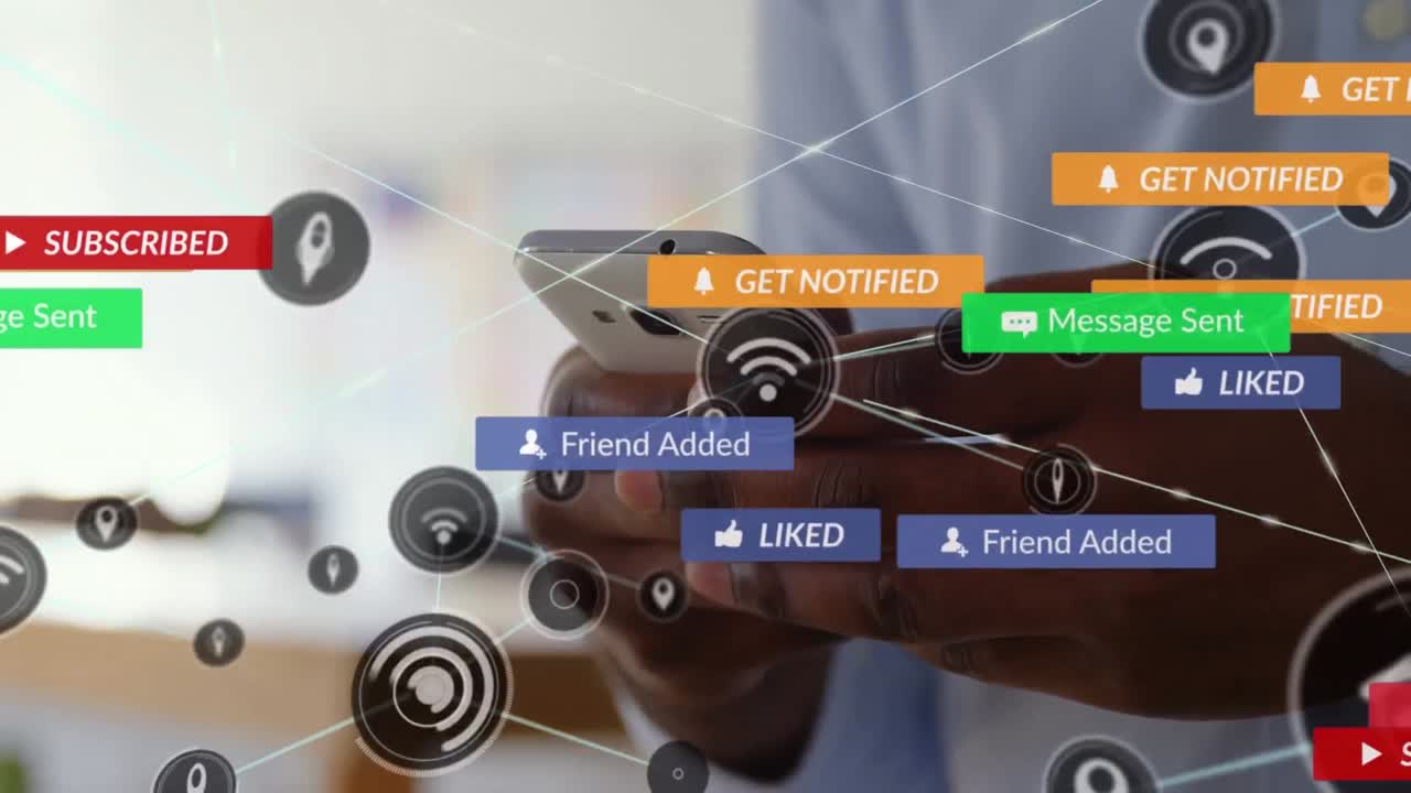 Animation of media icons over african american businessman using smartphone in office