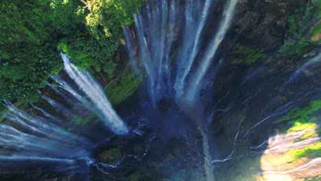 tumpak sewu rainbow waterfalls aerial scenic view, indonesia