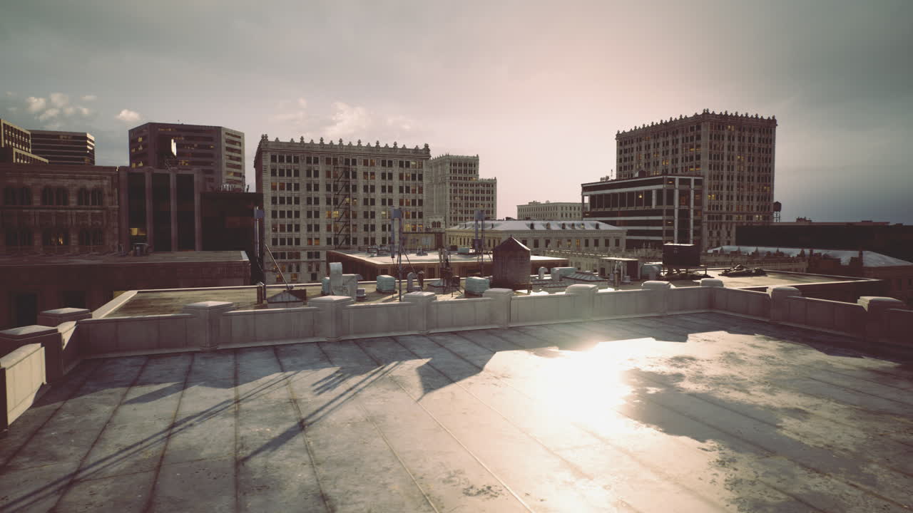 City skyline viewed from a rooftop during sunset with urban architecture