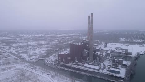 massive coal plant complex closed, aerial drone view in winter season