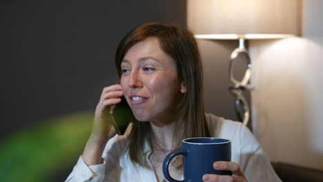 A-happy-young-woman-congratulating-friend-happy-talking-on-the-phone