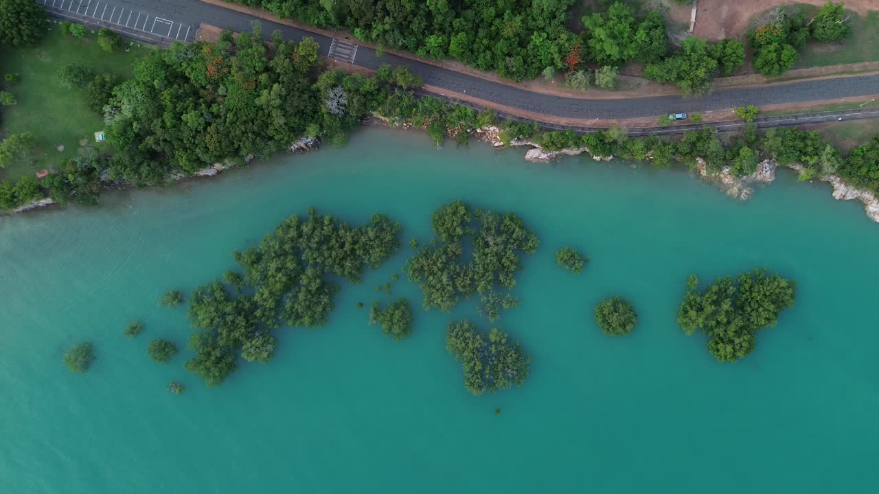 A breathtaking aerial view of mangroves in Darwin, Northern Territory, captured from above with the stunning turquoise sea below.