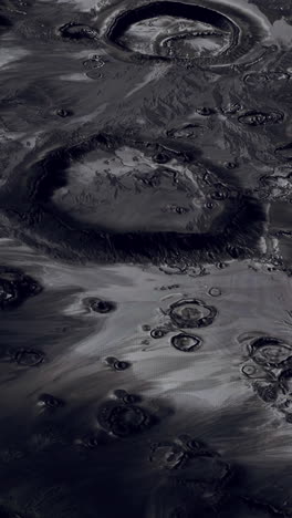 superficie de la luna con muchos cráteres