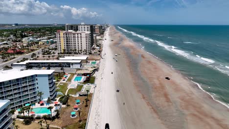 cars on beach aerial daytona beach florida