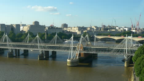 view to hungerford bridge and golden jubilee bridges, london, england