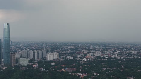 drone shot of rain falling over an area in mexico city