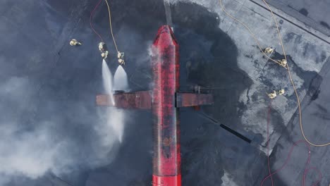 firefighters extinguishing intense engine fire during training in iceland