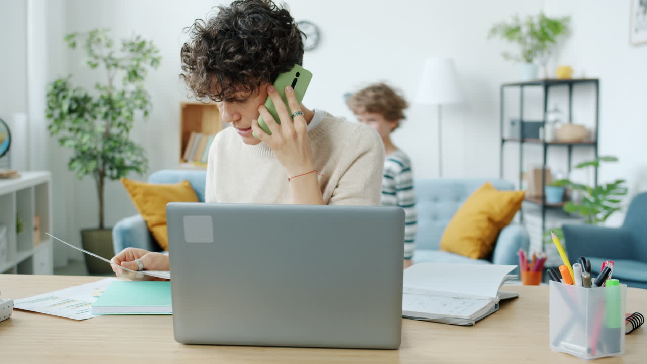 Working Mom Multitasking with Child at Home