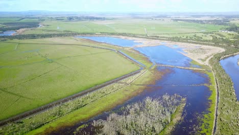 aerial view of flooded agricultural fields next to the tarwin river near tarwin lower, victoria, australia