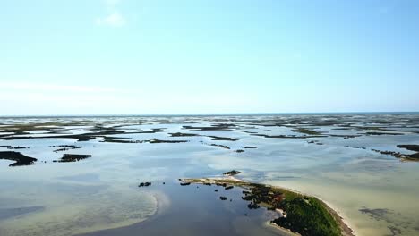 aerial view of round lakes near the sea