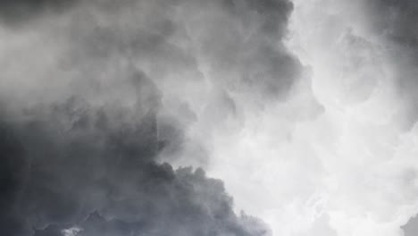 a thunderstorm inside the dark cumulus cloud