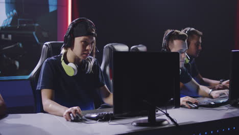 gaming team winning a match medium closeup of a gaming team winning a match at a tournament