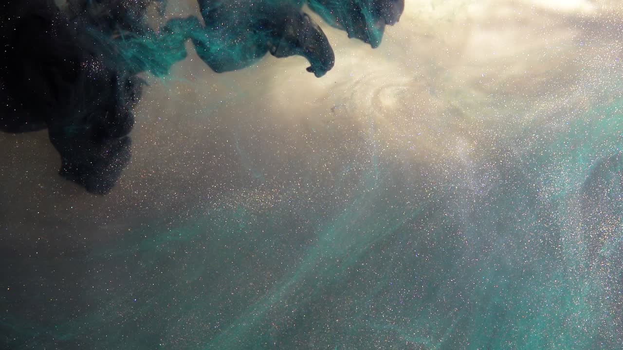 抽象的なインクと輝きの巻き