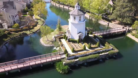 Bridgeport-Lighthouse,-descending-aerial-view,-during-the-day,-Valencia,-California