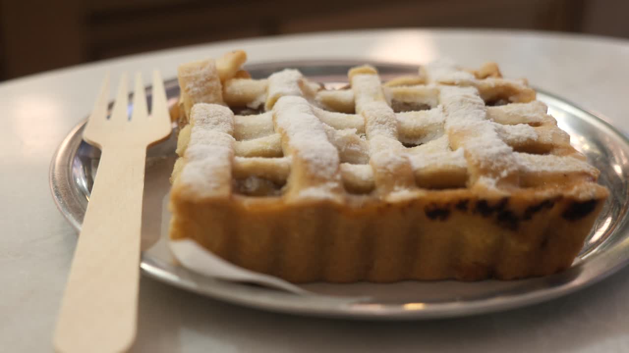 Tart with lattice crust and powdered sugar