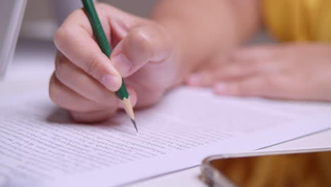 Close-up-of-an-individual-circling-some-words-while-thoroughly-checking-every-detail-for-the-final-proofreading-of-a-written-article