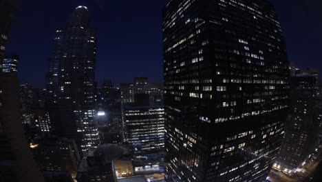 time-lapse de día a noche de algunos edificios en la ciudad de nueva york