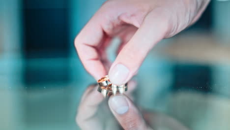 wedding rings on a table. wedding rings on a table on a light background