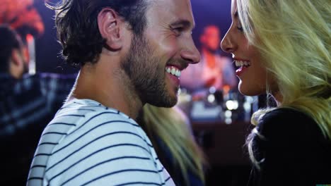 couple dancing at a concert 4k