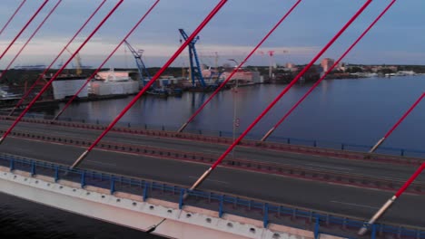 aerial shot of cable-stayed bridge on motława river in gdansk, poland