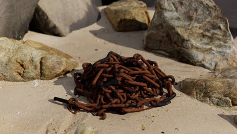 old rusted chain in the sand