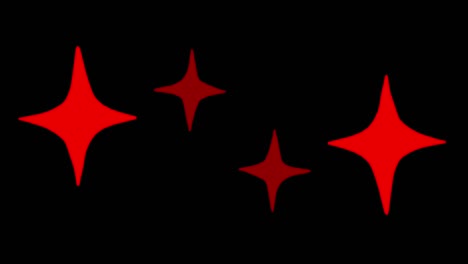 animation red stars shape sparkles on black background.