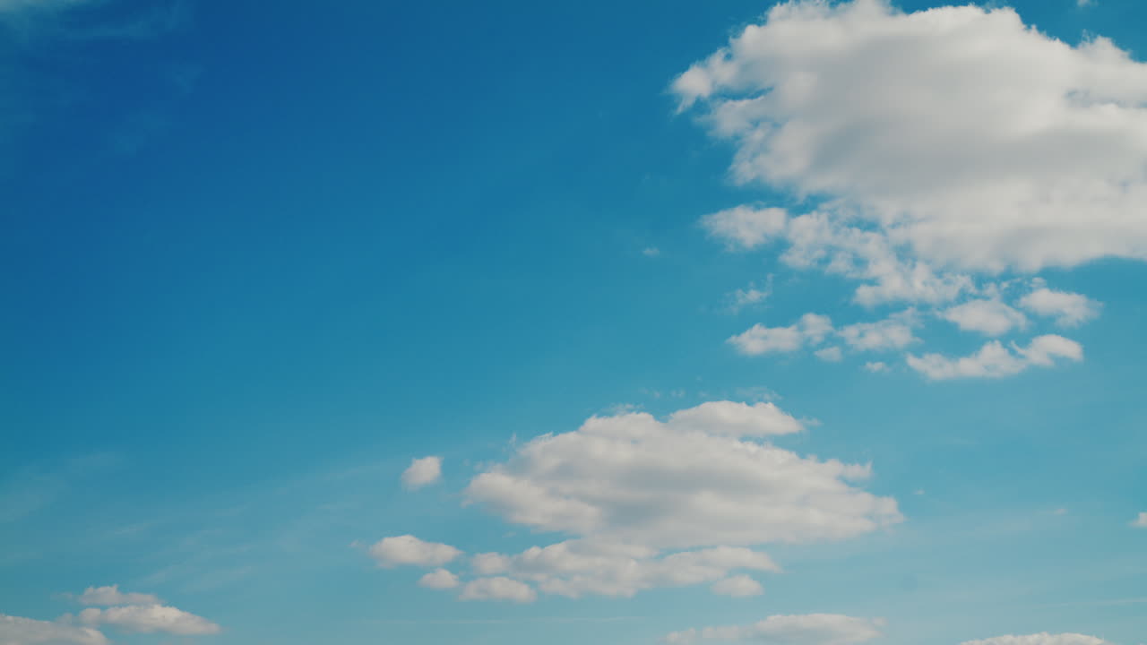 Timelapse Clouds Over Blue Sky