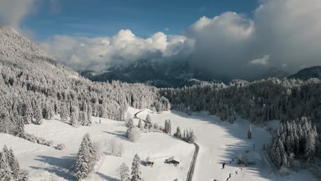 Picturesque-mountain-ridge-snowy-landscape-with-snow,-sunlight-and-blue-sky