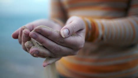 sand in hands