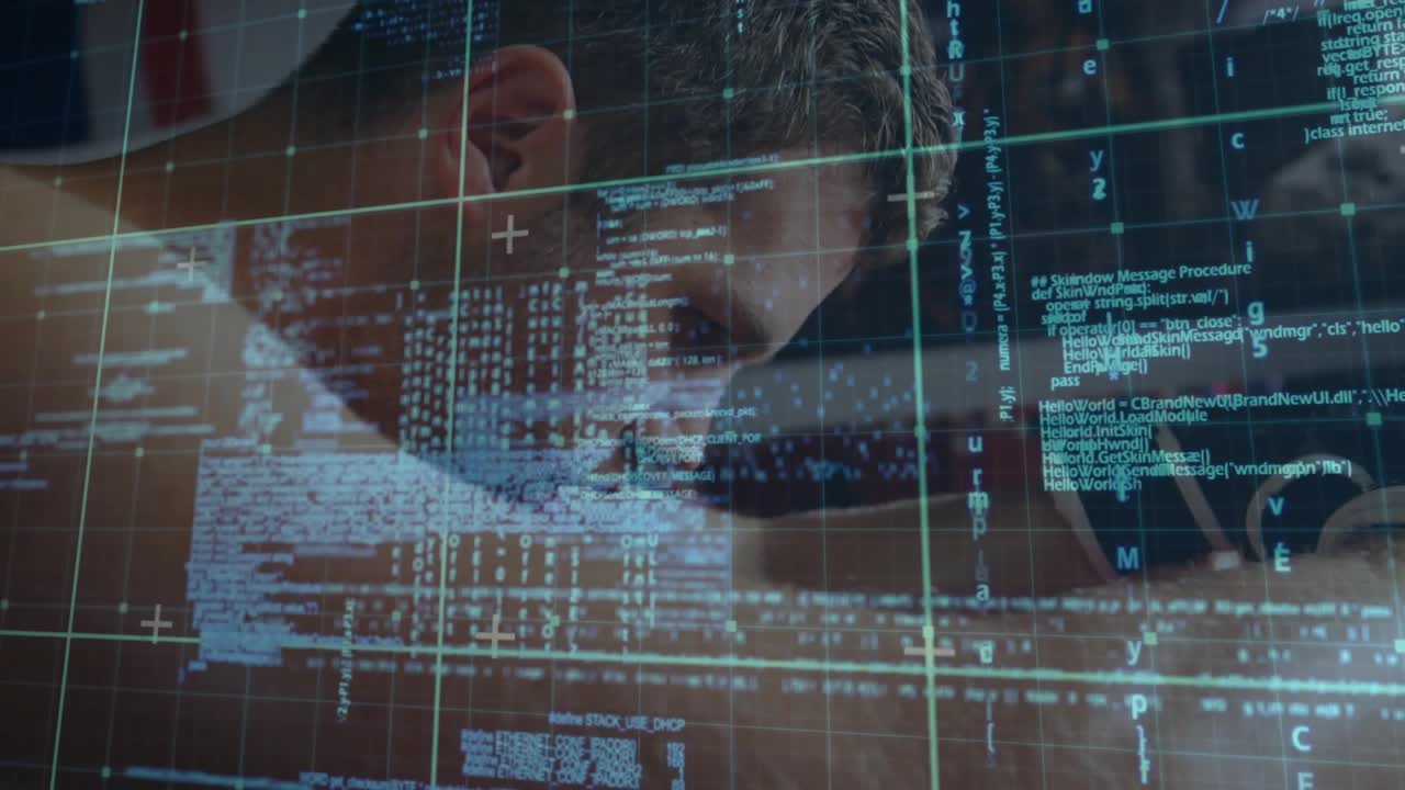 Developer leaning over desk after data feed appears on monitor, reading code overlay and green grid