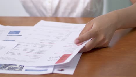 hands reviewing important documents an office setting highlights the essence of effective communication