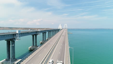 aerial view of a cable-stayed bridge across a body of water