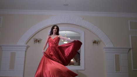 woman in a red satin gown