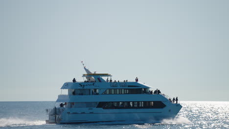 hervey bay whale watching tourist cruise boat sailing on ocean horizon in australia, 4k