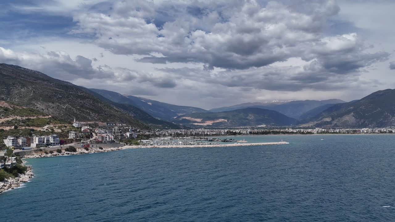Drone view with the movement of vehicles and sea views on a wonderful coastline