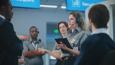airport security personnel in discussion