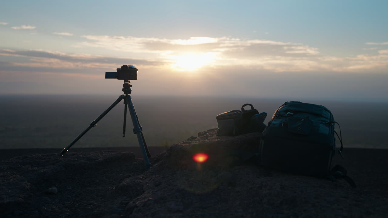 Photography Gear at Sunset on a Scenic Overlook