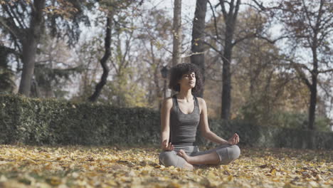 breathing in yoga healing exercise by a black yogi