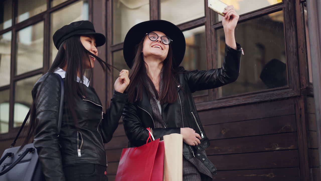 Two Women Taking a Selfie While Shopping