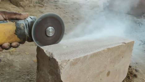 Stone-cutting-video-by-hand-holding-cutter-machine