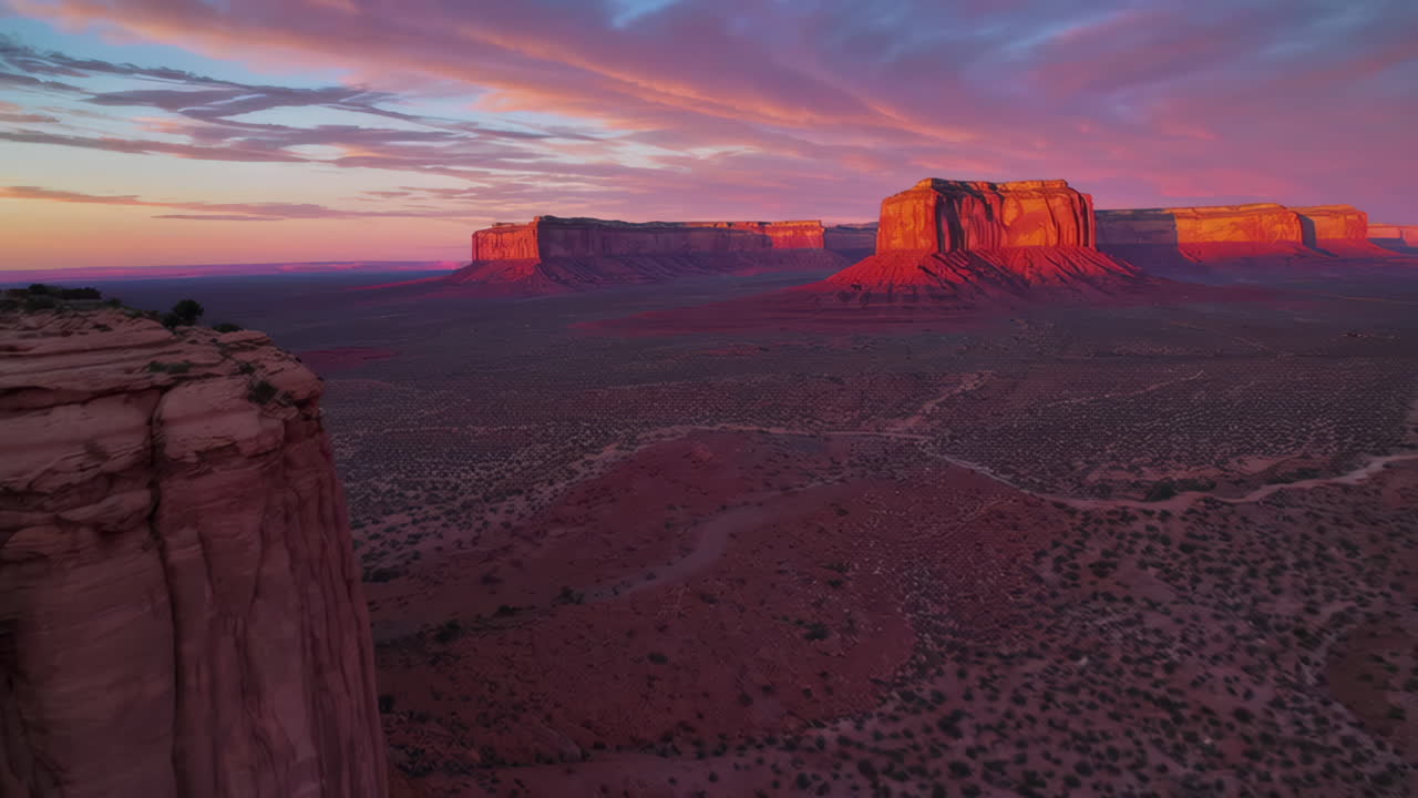 Vibrant Sunset Over Monument Valley Desert Landscape