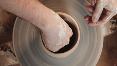 pottery making process using a pottery wheel