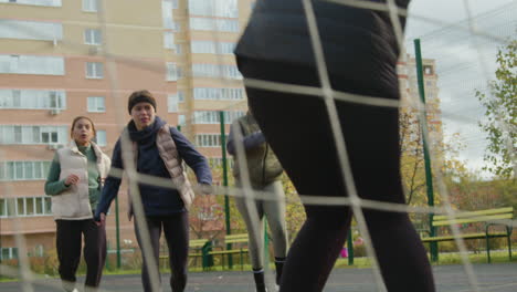 Woman-getting-hurt-playing-football