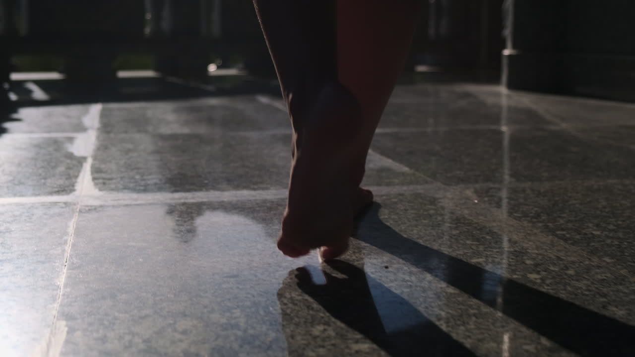 Barefoot walk on stone tiles