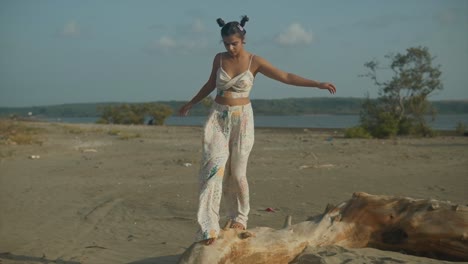 a fearless indian woman, dressed in pristine white, fearlessly explores an old trunk with a spirit of adventure and perfect balance