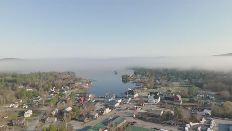 a foggy morning over greenville and moosehead lake